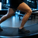 Coureur sur tapis de course incurvé non motorisé, effort jambes